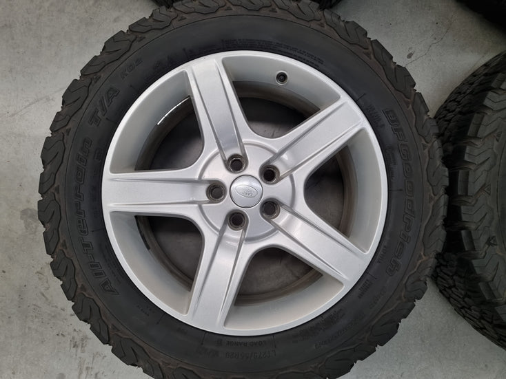 Load image into Gallery viewer, Genuine Land Rover Defender L663 Silver 20 Inch Wheels and Tyres Set of 4