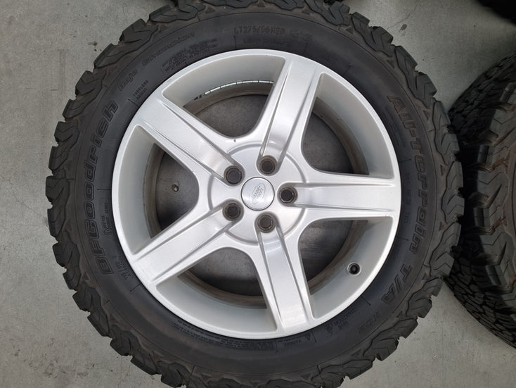 Load image into Gallery viewer, Genuine Land Rover Defender L663 Silver 20 Inch Wheels and Tyres Set of 4