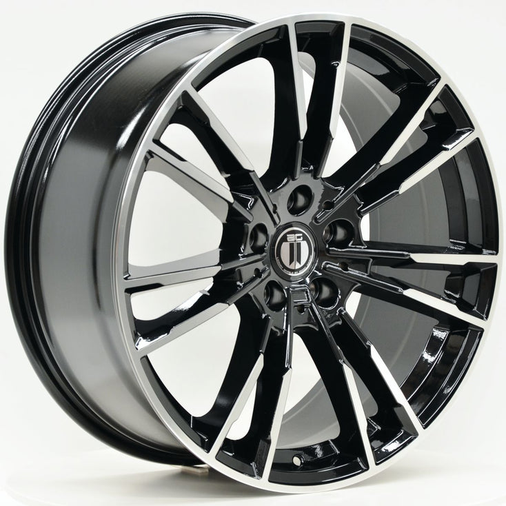 Load image into Gallery viewer, M440 20 Inch Staggered ET23 5/112 Black Machined